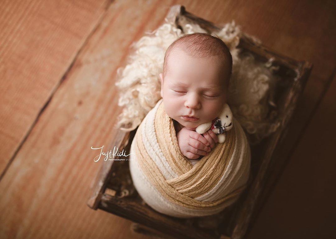 Newborn Photography - With a Toy Pose